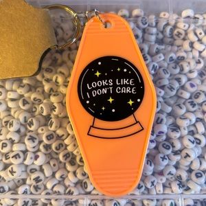 Looks like I don’t care 🔮 Crystal ball keychain - orange